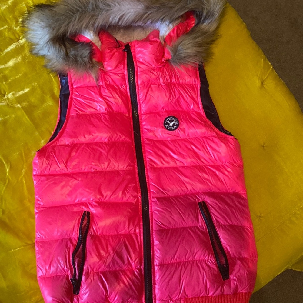 Hot pink vest from American Eagle.